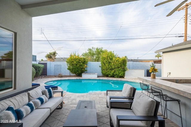 6450 E Vernon Ave, Scottsdale, AZ 85257 - view of swimming pool with outdoor lounge area, a fenced backyard, and a patio area