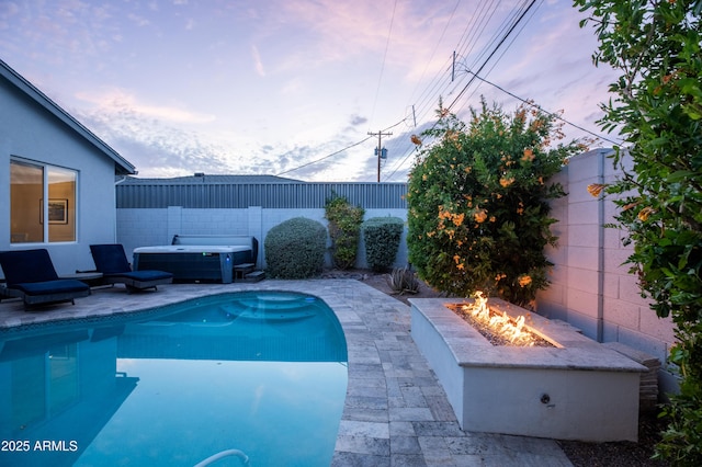 6450 E Vernon Ave, Scottsdale, AZ 85257 - view of swimming pool with a hot tub, an outdoor fire pit, a fenced backyard, and a patio