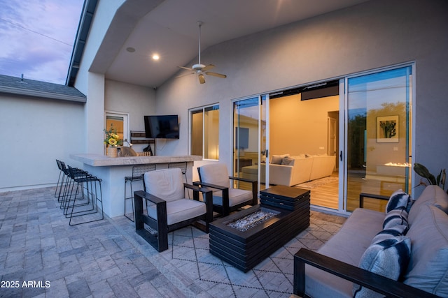 6450 E Vernon Ave, Scottsdale, AZ 85257 - view of patio with an outdoor living space with a fire pit and a ceiling fan