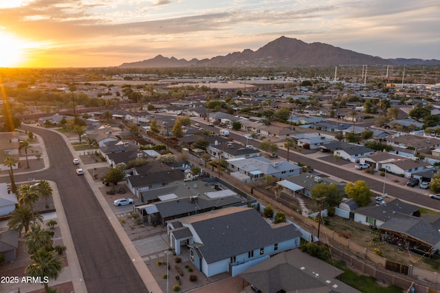 6450 E Vernon Ave, Scottsdale, AZ 85257 - aerial view at dusk of a mountain view and a residential view