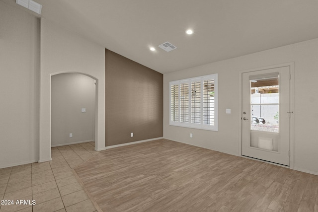 empty room with light wood-type flooring