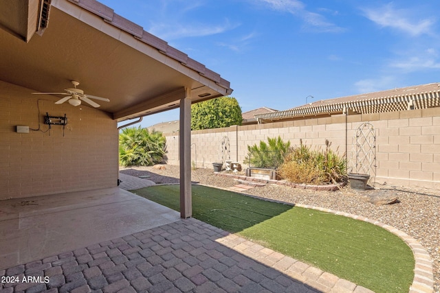 view of patio featuring ceiling fan