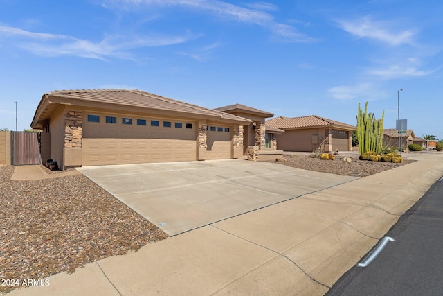 prairie-style home featuring a garage