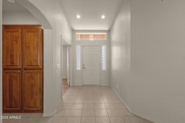 view of tiled foyer entrance