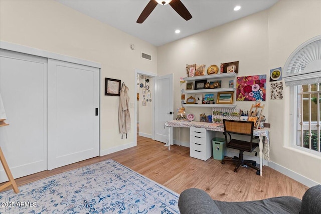office space with ceiling fan, recessed lighting, baseboards, light wood-type flooring, and visible vents