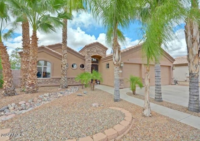 view of front of home with a garage