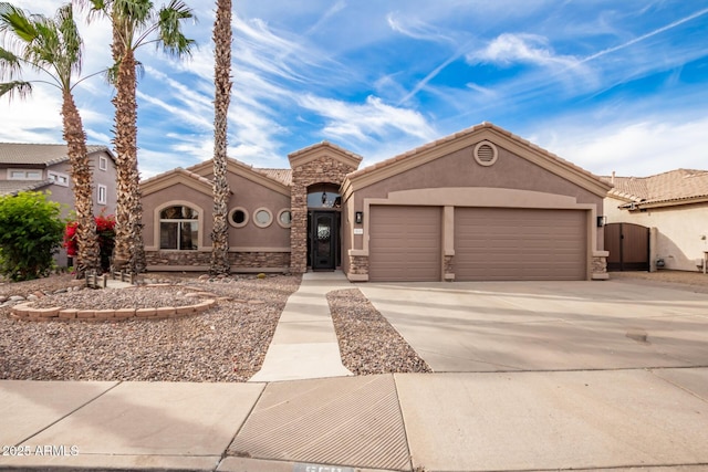 view of front of home with a garage