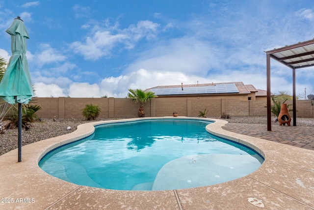 view of pool featuring a fenced in pool, a patio, and a fenced backyard