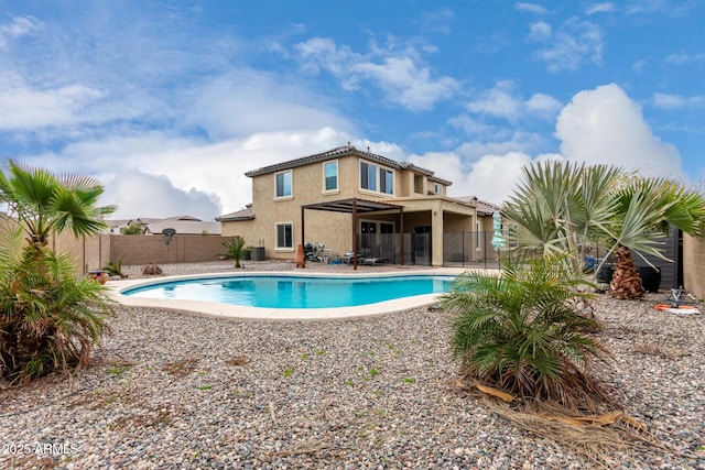 view of swimming pool with a patio area, a fenced backyard, and a fenced in pool