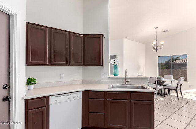 14216 N Saguaro Blvd Unit A, Fountain Hills, AZ 85268 - kitchen with dark brown cabinetry, dishwasher, a sink, light countertops, and a chandelier