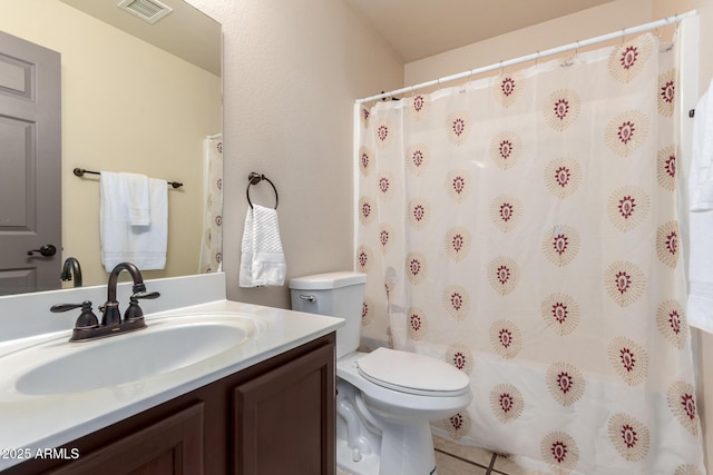 14216 N Saguaro Blvd Unit A, Fountain Hills, AZ 85268 - bathroom featuring visible vents, vanity, toilet, a shower with shower curtain, and tile patterned floors