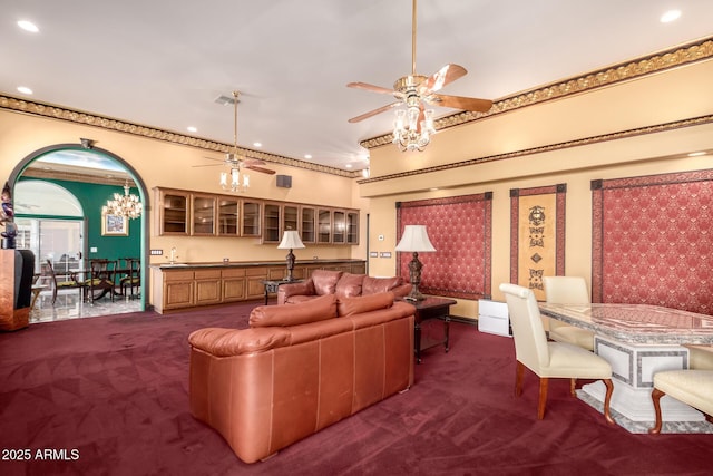 living room with carpet floors and ceiling fan