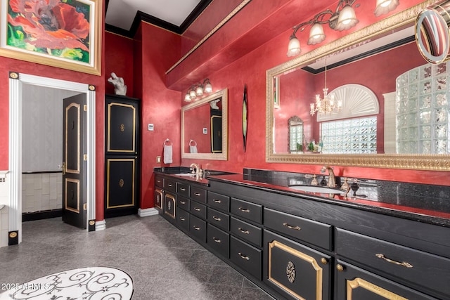 bathroom featuring vanity and an inviting chandelier