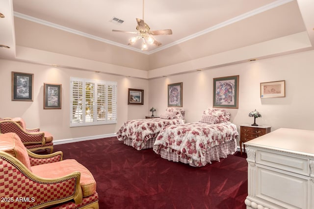 bedroom featuring crown molding, dark carpet, a raised ceiling, and ceiling fan