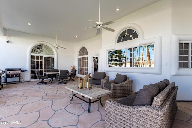 view of patio with a grill, an outdoor hangout area, and ceiling fan