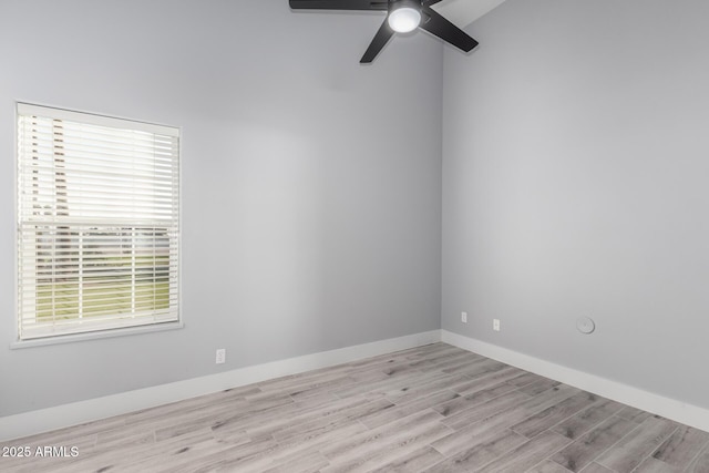 unfurnished room featuring ceiling fan and light wood-type flooring