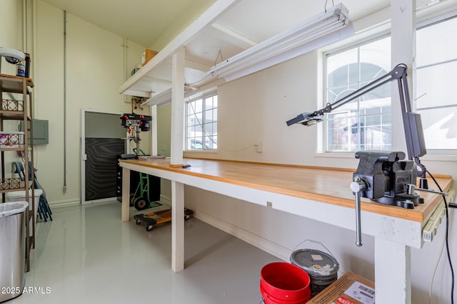 kitchen with wooden counters and concrete floors