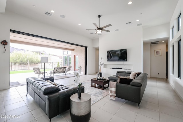 living room with visible vents, recessed lighting, and ceiling fan