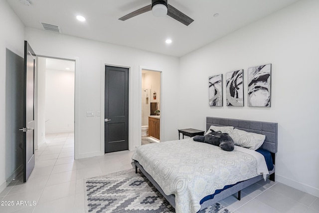 bedroom with baseboards, visible vents, recessed lighting, and connected bathroom