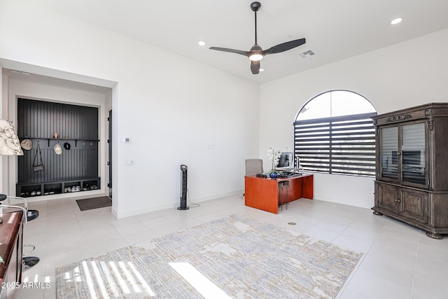 unfurnished office with tile patterned flooring, ceiling fan, recessed lighting, and visible vents