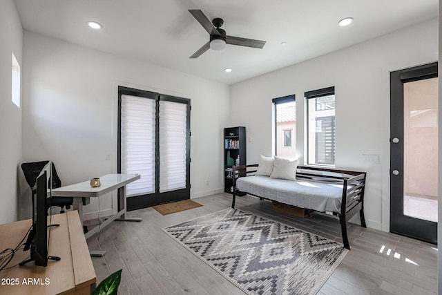 bedroom featuring light wood-style floors and recessed lighting