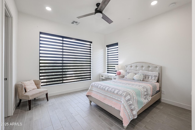 bedroom with ceiling fan, recessed lighting, baseboards, wood finished floors, and visible vents