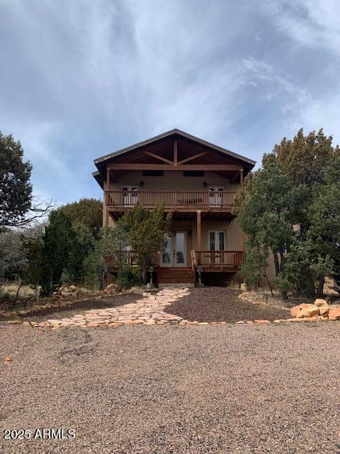 3464 High Country Dr, Heber, AZ 85928 - back of property with a wooden deck and french doors