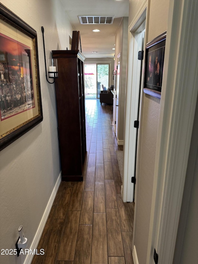 10704 E Twister Ave, Mesa, AZ 85212 - hall with dark wood finished floors and baseboards