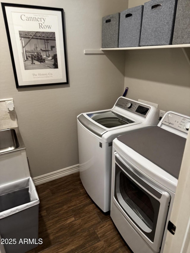 10704 E Twister Ave, Mesa, AZ 85212 - washroom with separate washer and dryer, dark wood finished floors, and baseboards