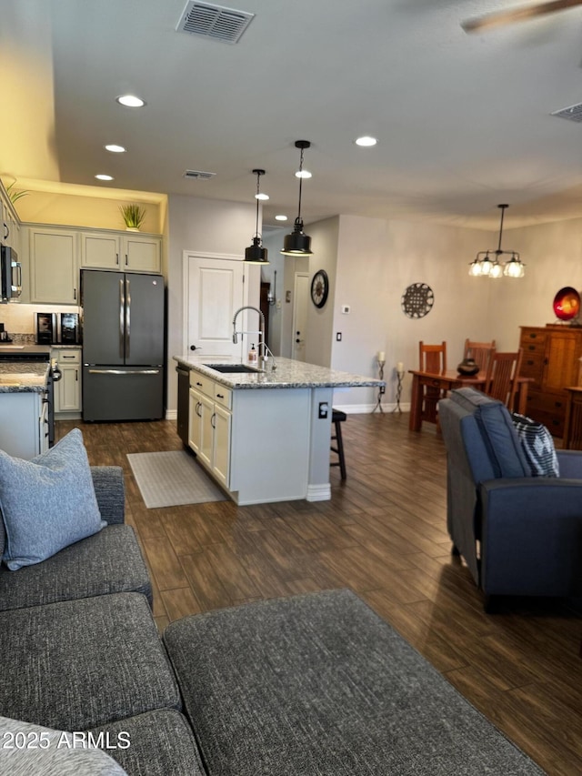 10704 E Twister Ave, Mesa, AZ 85212 - living room with dark wood-type flooring, recessed lighting, baseboards, and a ceiling fan
