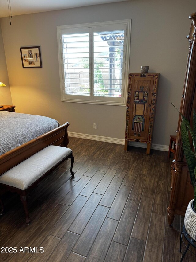 10704 E Twister Ave, Mesa, AZ 85212 - bedroom featuring dark wood-type flooring, baseboards, and multiple windows