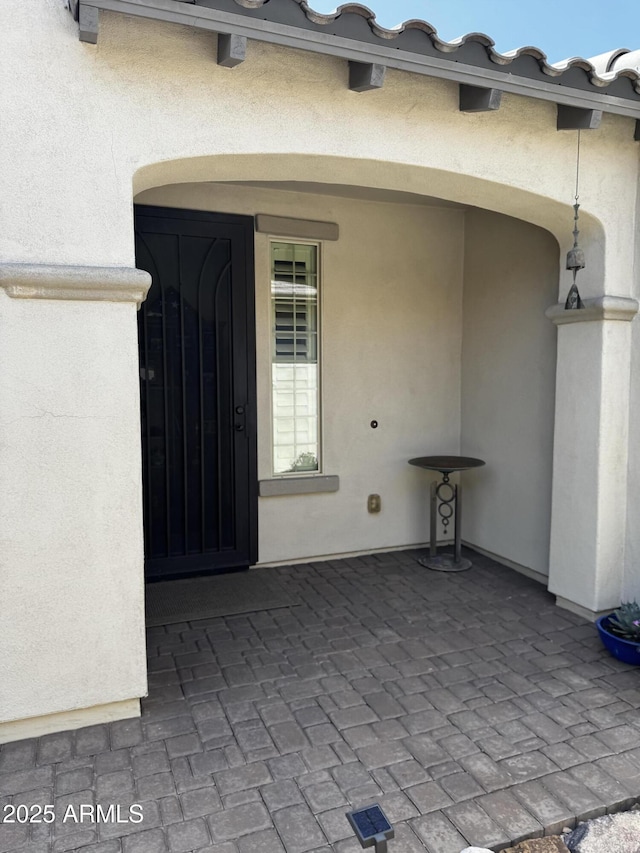 10704 E Twister Ave, Mesa, AZ 85212 - view of exterior entry featuring stucco siding