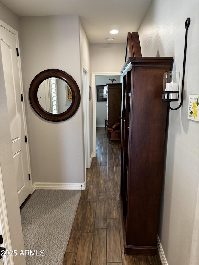 10704 E Twister Ave, Mesa, AZ 85212 - hallway featuring dark wood-style flooring, baseboards, and recessed lighting