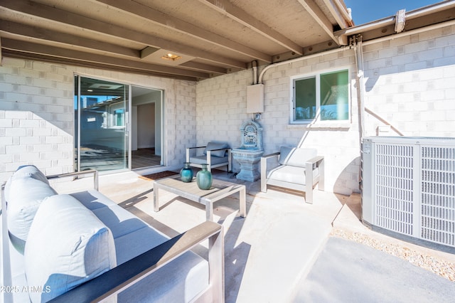 view of patio featuring central AC and outdoor lounge area