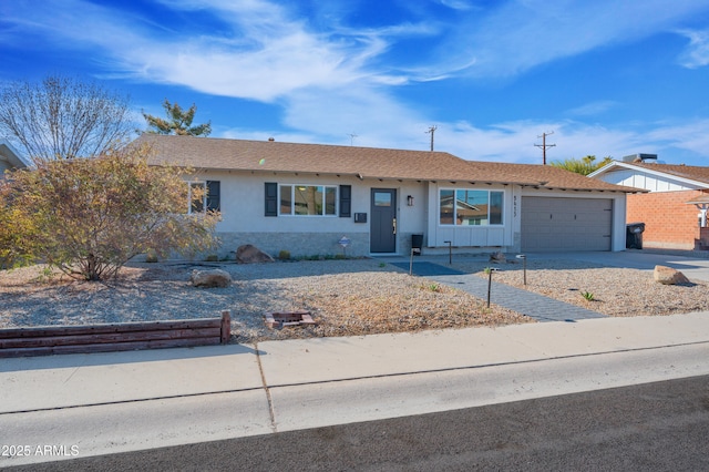 ranch-style home with a garage