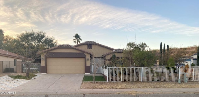 view of front of home with a garage