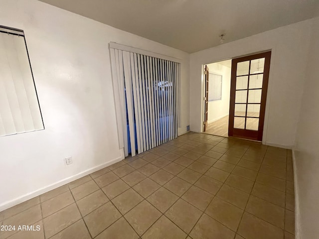 view of tiled spare room