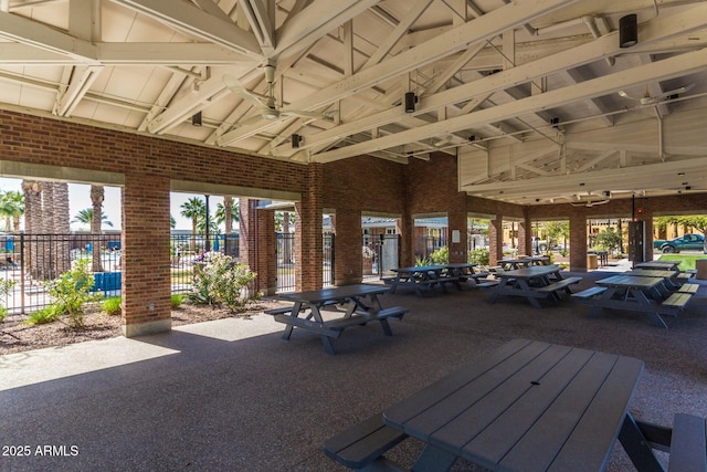 view of patio / terrace featuring fence