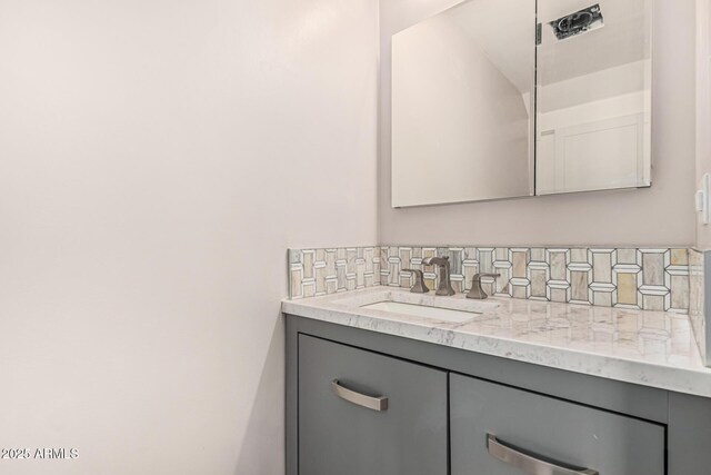 18 E Hermosa Dr Unit 18, Tempe, AZ 85282 - bathroom featuring vanity and tasteful backsplash