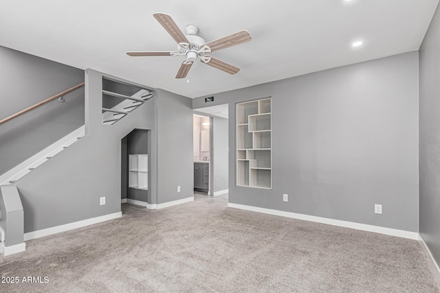 18 E Hermosa Dr Unit 18, Tempe, AZ 85282 - unfurnished living room with carpet floors, a ceiling fan, recessed lighting, stairs, and built in shelves