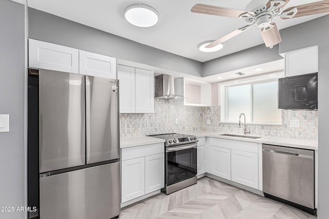 18 E Hermosa Dr Unit 18, Tempe, AZ 85282 - kitchen with appliances with stainless steel finishes, wall chimney range hood, light countertops, and white cabinets