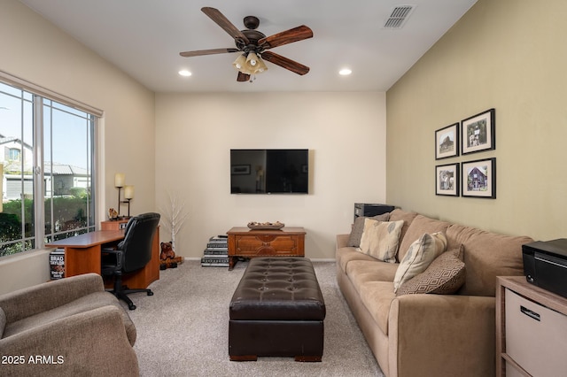 carpeted living area featuring ceiling fan, visible vents, and recessed lighting