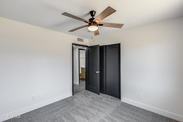 3011 E John Cabot Dr, Phoenix, AZ 85032 - unfurnished bedroom featuring carpet flooring, baseboards, and a ceiling fan