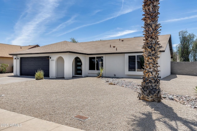 3011 E John Cabot Dr, Phoenix, AZ 85032 - ranch-style home featuring a garage, driveway, roof with shingles, and stucco siding