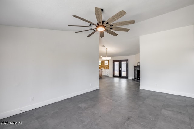 3011 E John Cabot Dr, Phoenix, AZ 85032 - unfurnished living room featuring a ceiling fan, baseboards, vaulted ceiling, and a brick fireplace