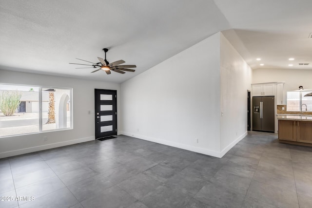 3011 E John Cabot Dr, Phoenix, AZ 85032 - entryway with lofted ceiling, a ceiling fan, baseboards, and recessed lighting