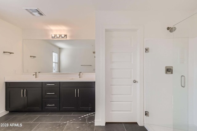 2364 N 212th Ave, Buckeye, AZ 85396 - bathroom with double vanity, tile patterned floors, and a stall shower