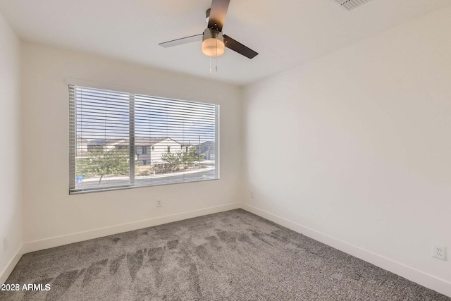 2364 N 212th Ave, Buckeye, AZ 85396 - unfurnished room with carpet floors, baseboards, and a ceiling fan