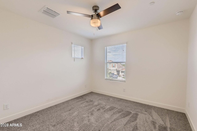 2364 N 212th Ave, Buckeye, AZ 85396 - unfurnished room featuring a ceiling fan, carpet, and baseboards