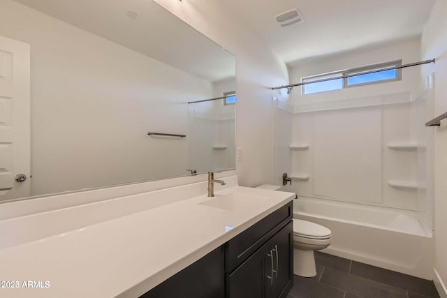 2364 N 212th Ave, Buckeye, AZ 85396 - bathroom featuring toilet, vanity, shower / tub combination, and tile patterned floors
